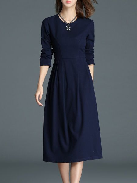 Marineblauwe jurk met lange mouwen